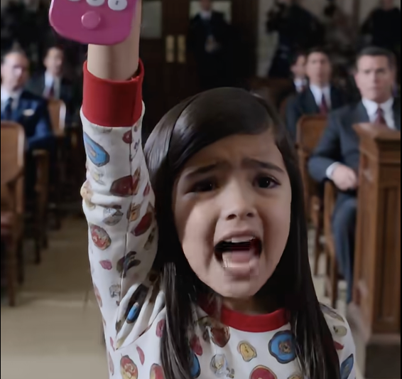The pink toy phone slipped from the girl’s trembling hands as the courtroom erupted.